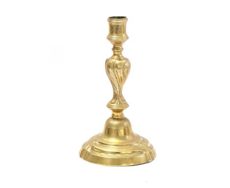 Ormolu candlestick, Louis XVI, France 18th century. A copper candlestick from France (Perigord), hammered and gilt, twisted s