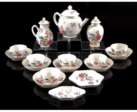 11-piece porcelain tea set with polychrome floral decor, China Qianlong period b.u. teapot 13 cm high (hairlines), 6 cups and