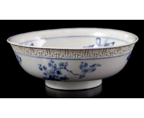 Porcelain bowl with blue and white decoration of 4 long lines and Taoist symbols on the inside and floral decoration and reli