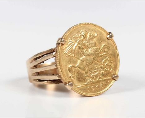 A gold ring, mounted with an Edward VII half-sovereign 1908, with pierced shoulders, detailed ‘9ct’, weight 7.5g, ring size a