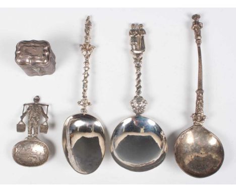 A group of Dutch silver, 18th century and later, comprising a cachou box and cover, height 3.9cm, a caddy spoon and two spoon