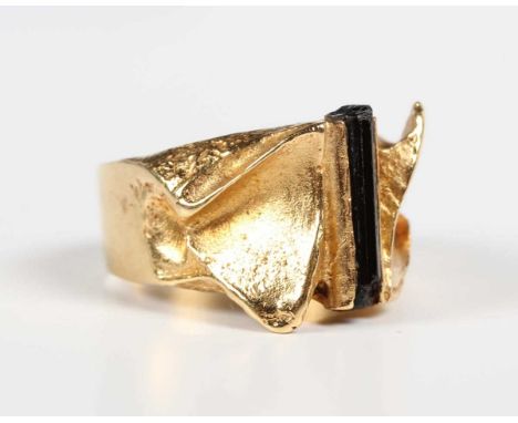 A Finnish Björn Weckström gold and tourmaline ring in an abstract design, mounted with a tourmaline crystal, detailed ‘750 Fi