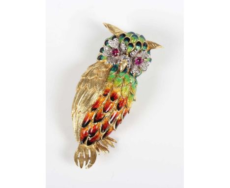 A gold, diamond, ruby and varicoloured enamelled brooch, designed as an owl, with circular cut ruby set eyes, otherwise mount