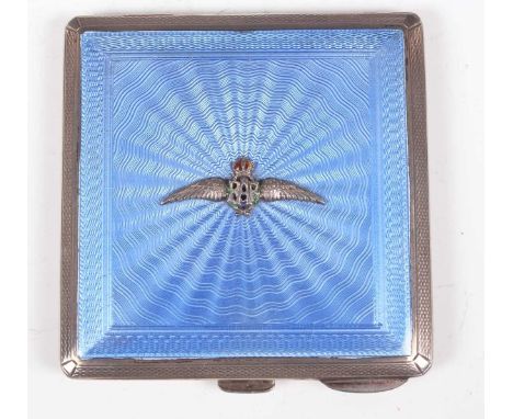 A George VI silver and blue enamelled square compact, the front applied with 'RAF' wings against a radiating engine turned gr