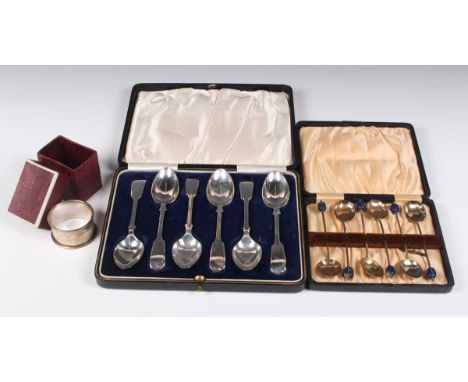 A set of six George V silver Fiddle pattern teaspoons, Birmingham 1921 by Daniel &amp; Arter, cased, and a silver napkin ring