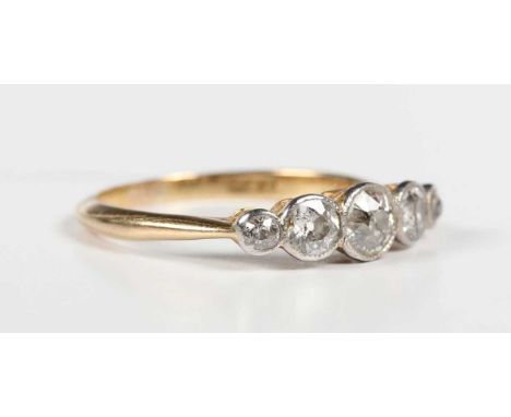 A gold and diamond five stone ring, mounted with a row of graduated old cut diamonds, detailed ‘18ct’, weight 1.8g, ring size