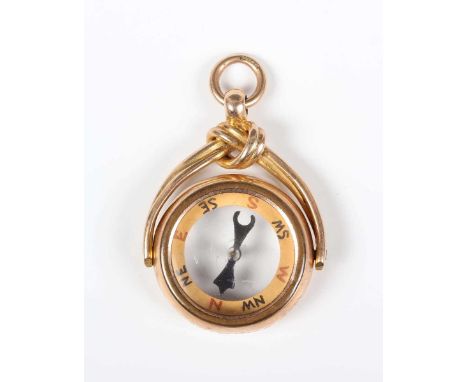 A 15ct gold compass rotating pendant fob, Birmingham 1918, weight 9.8g, length 3.6cm.