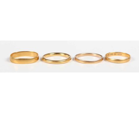 A 22ct gold wedding ring, Birmingham 1921, ring size approx L, and three further 22ct gold wedding rings, total weight 8.8g.