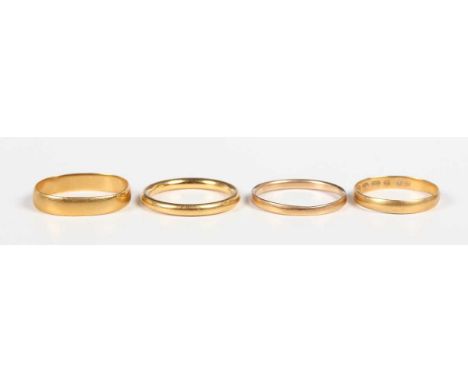 A 22ct gold wedding ring, Birmingham 1921, ring size approx L, and three further 22ct gold wedding rings, total weight 8.8g.