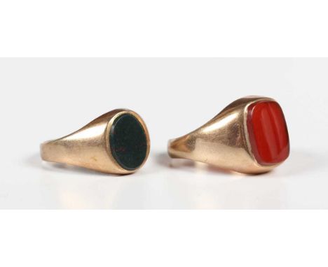 A 9ct gold and bloodstone oval signet ring, Birmingham 1979, ring size approx H, and a 9ct gold and cornelian curved rectangu