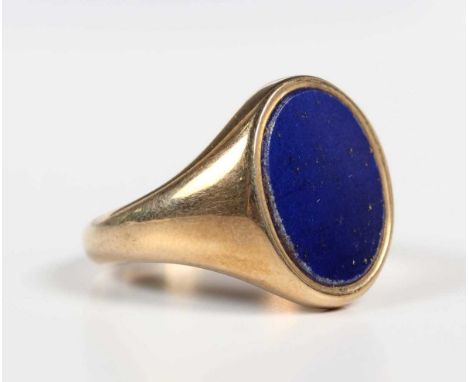 A 9ct gold and lapis lazuli oval signet ring, Sheffield 1976, weight 7.1g, ring size approx P1/2, with a case.