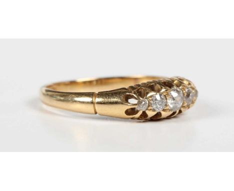 A gold and diamond five stone ring, mounted with old cut diamonds graduating in size to the centre stone, unmarked, weight 3.