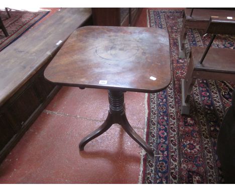 A 19th Century mahogany tilt top occasional table on ring turned column and tripod legs 74cm high, 56cm wide 