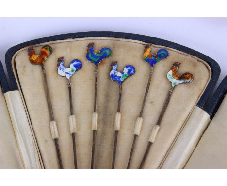 A set of six silver and enamel cocktail sticks, in case, with chicken finials and various silver and collectable items 