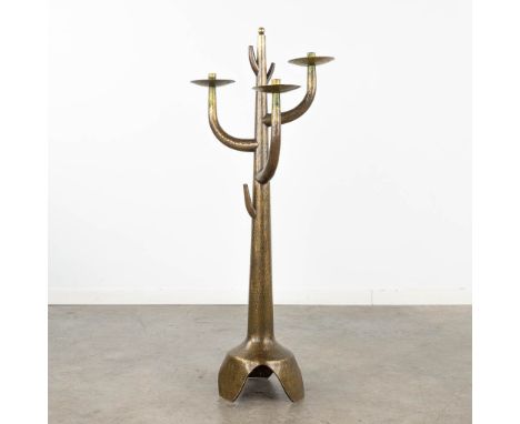 A candlestick with three candle holders, hammered copper, probably France, circa 1960.Dimensions: (D:29 x W:40 x H:104 cm)