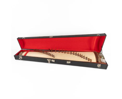 An Oriental instrument 'Dan Tranh' mother of pearl inlay. The second half of the 20th century. Stored in a chest. Dimensions: