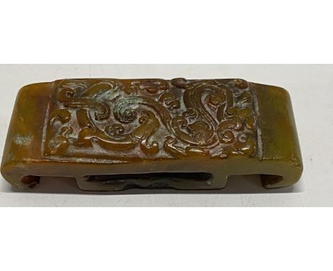 A Chinese jade belt buckle 