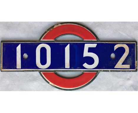 London Underground enamel 'bullseye' STOCK-NUMBER PLATE from 1938 tube stock driving motor car 10152. These plates were fitte