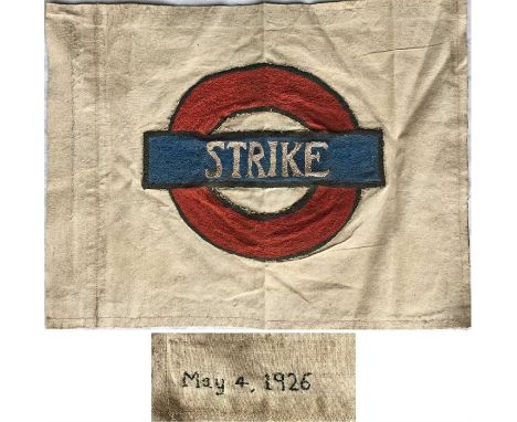 A 1926 General Strike cotton FLAG with the word 'Strike' on the bar of an Underground Group bar & circle motif. The date 'May