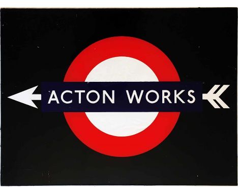 A London Underground BULLSEYE SIGN 'ACTON WORKS' with double-flighted arrow. Made of perspex and designed to be back-lit. c19