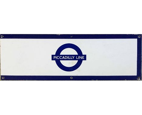 London Underground 1950s/60s enamel STATION FRIEZE PLATE for the Piccadilly Line with the line name on the bar of a tradition