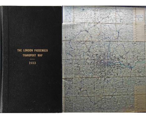 The London Passenger Transport MAP, 1933'. Officially hand-coloured onto 1" Ordnance Survey maps, linen-backed inside stiff l