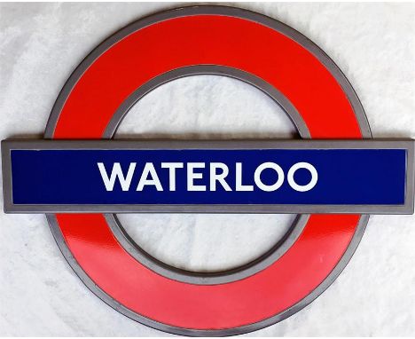 London Underground enamel STATION ROUNDEL SIGN  from Waterloo station. A modern "silhouette" roundel in an integral alloy fra