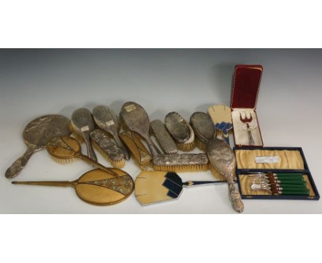 A selection of mostly silver back dressing mirrors and brushes, various dates and makers; a set of six silver fruit forks, gr