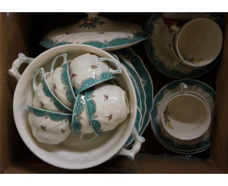 A part dinner service by Royal Doulton, Lowestoft Bouquet pattern, blue fish scale detailing to rims and rosebud design, base