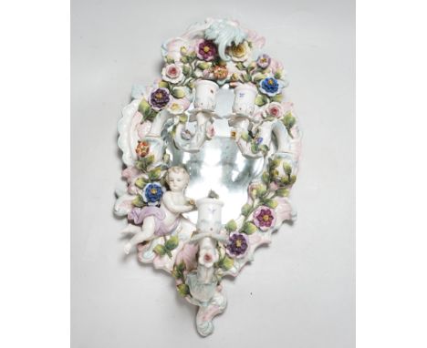 A 19th century French or German floral encrusted 3 sconce wall mirror, 48cm long