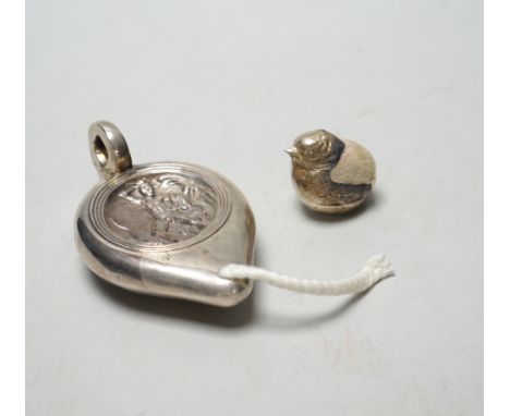 An Edwardian silver perpetual lighter, modelled as a lamp, embossed with figure, London, 1909, 91mm, together with a similar 
