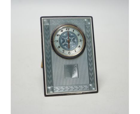 A 1920's Swiss 935 white metal and guilloche enamel mounted rectangular easel timepiece, 10.6cm.