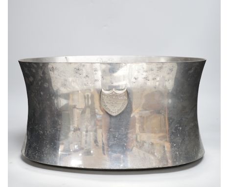 A pair of Dom Perignon pewter wine coolers, designer M Szekely, 21.5cm high x 39cm wide