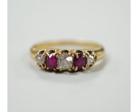 A yellow metal, two stone ruby and three stone diamond set half hoop ring, size J, gross weight 2.2 grams.
