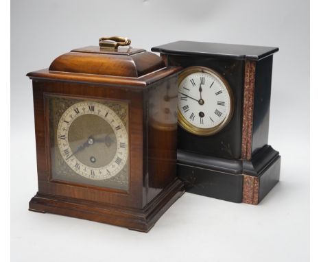 A black slate mantel clock and a walnut mantel clock, 25cm
