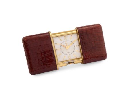  MOVADO ERMETO PULLMAN 8-DAYS, 50S Case: signed, n. 896417, gold plated, covered in leather.  Dial: signed, silvered, applied
