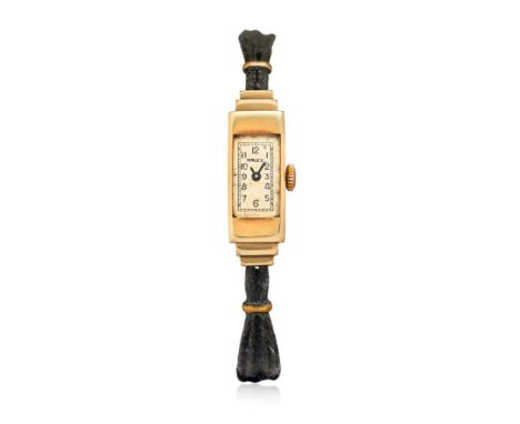  ROLEX IN GOLD, 1920S Case: signed, 9K gold, n. 2305 558097, snap on caseback, hooded and stepped lugs.  Dial: signed, silver