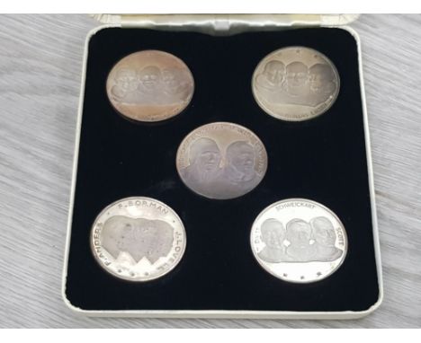 SET OF 5 SILVER 1OZ MEDALS COMMEMORATING THE FIRST LANDING ON THE MOON, NUMBERED 599 FROM A LIMITED EDITION OF 1000, HOUSED I