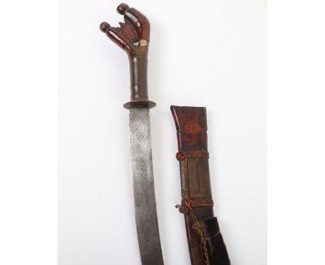 Murut Sword Pakayun from Kalimantan, 19th&nbsp;Century, sharply curved single edge blade, brass grip, circular guard and wood