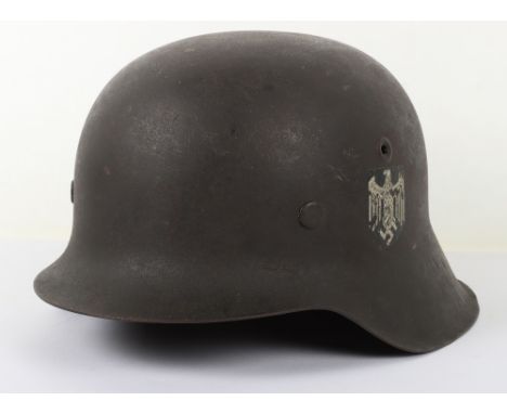 WW2 German Army M-42 Pattern Single Decal Steel Combat Helmet, good example retaining its original combat paint finish to the