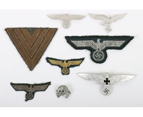 Grouping of WW2 German Cloth and Metal Insignia, consisting of German army flat wire NCO’s tunic breast eagle, Coastal Artill
