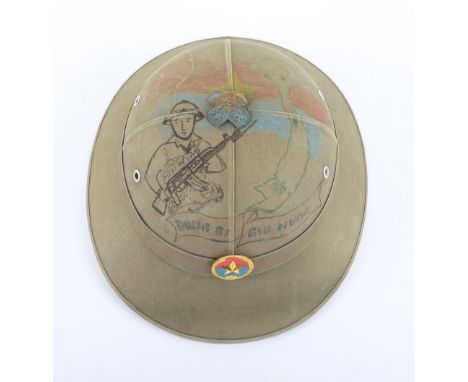 North Vietnamese Army (N.V.A) Pith Helmet, fine green cloth covered pith helmet with badge to the centre. Top of the helmet w