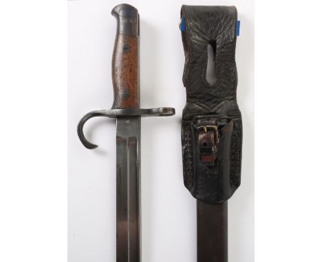 Japanese Type 30 Arisaka Bayonet with Tokyo Arsenal Mark, wooden grip with the early type oval screw fittings. Muzzle ring an