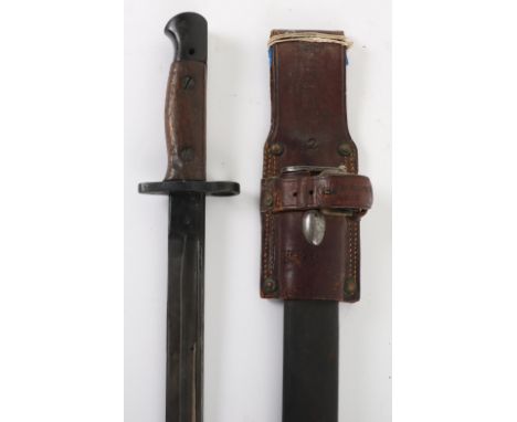 WW1 Canadian Issued 1907 Pattern Bayonet by Wilkinson, with two piece wooden slab grips. Steel pommel with oil hole. Steel cr