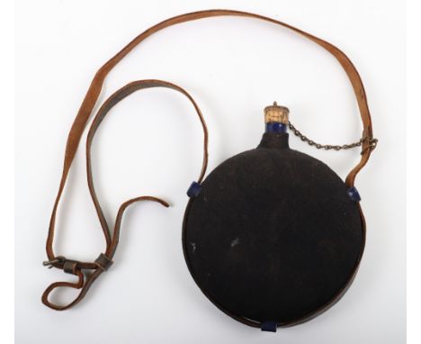 WW1 Period Red Cross Water Bottle, interesting blue enamel circular water bottle with black cloth covering and brown leather 