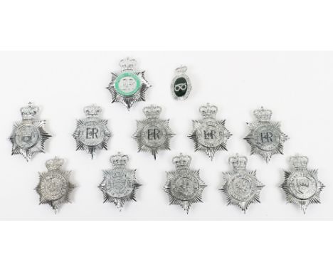 Twelve Obsolete Queens Crown Police Helmet Plates, including: chrome Luton County Borough Police, West Sussex constabulary, M