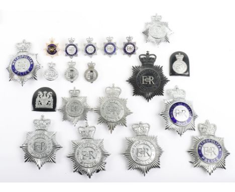 A  Collection of Obsolete Metropolitan Police Badges, including: QC  EIIR centre black helmet plate, QC loose EIIR centre chr