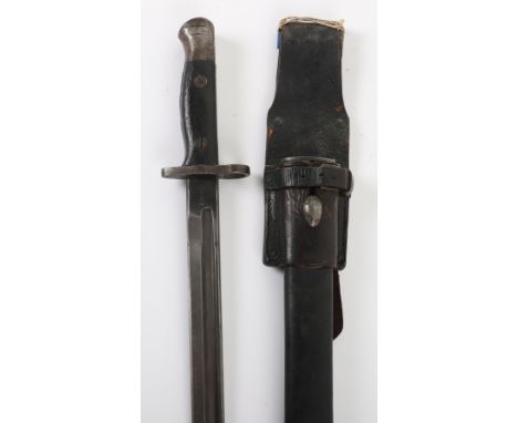 WW1 Canadian Issue 1907 Bayonet by Remington, two piece wooden grips with steel pommel having Canadian War Department stamp. 