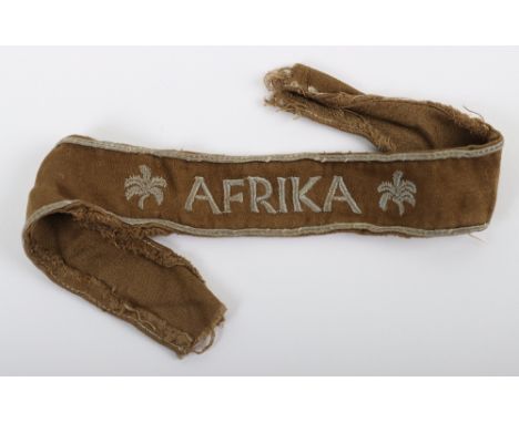 WW2 German Afrika Campaign Cuff Title, fine example of a full length cuff title in light brown mohair with machine embroidere