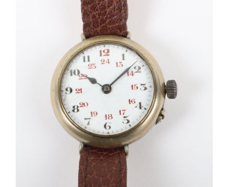 WW1 British Officers Trench Watch, white enamel dial with 12 and 24 hour numerals to the face. Complete with the hands. Mount